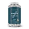 Een doorzichtige pot met witte capsules en een blauw etiket met de tekst 'Tribulus.