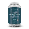 Een doorzichtige pot met witte tabletten, een wit deksel en een donkerblauw etiket.