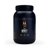 Zwarte pot met een etiket met de tekst "The Whey" van Myprotein.