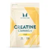 Een witte, hersluitbare zak van Myprotein Creatine Gummies met een geel design.