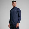 Een marineblauw trainingspak met lange mouwen en een korte rits, met een klein logo.