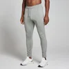 Een stormgrijze MP trainingsjoggingbroek voor heren, met een trekkoord en een klein logo.