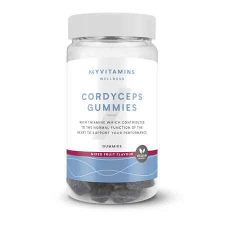 Transparante pot met witte deksel, gevuld met donkere gummies.