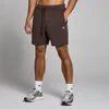 Een chocoladebruine MP joggingbroek voor heren, met trekkoord en een klein wit logo.